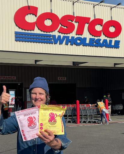 Wunderground founder Jody Hall holding Brain Wash SuperBoost and Craft Instant outside Costco.